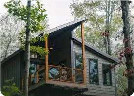 A Treetop Escapes treehouse among the trees