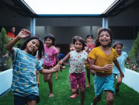 Children playing at a Child Impact home
