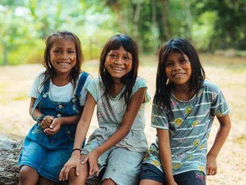 Three sponsored girls smiling together